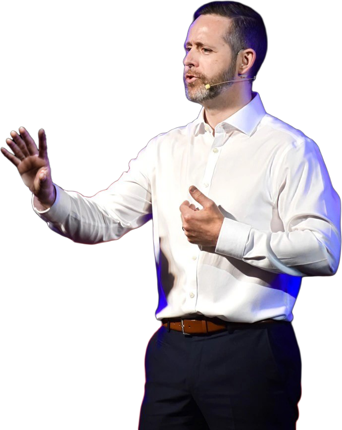 Kevin O'Reilly speaking on stage